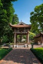 Square building holding a big bell on side of Imperial Academy in Temple of Literature Van Mieu, the first national university Royalty Free Stock Photo