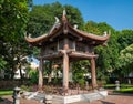 Square building holding a big bell on side of Imperial Academy in Temple of Literature Van Mieu, the first national university Royalty Free Stock Photo