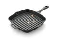 Square cast iron grill pan for cooking isolated on white background Royalty Free Stock Photo