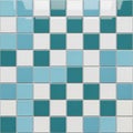 Square ceramic tiles in a grid pattern, featuring shades of blue and white. Tiles are Royalty Free Stock Photo