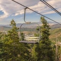 Square Chairlifts with an aerial view of the Park City landscape on a sunny summer day