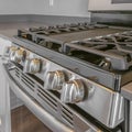 Square Close up of the cooktop and oven of a range inside a modern kitchen Royalty Free Stock Photo