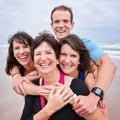 Square close up of happy family all smiling towards camera Royalty Free Stock Photo