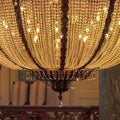 Square Close up of a stunning chandelier with sparkling and glittering crystal beads Royalty Free Stock Photo