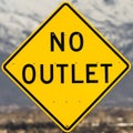 Square Close up view of a bright yellow and black No Outlet road sign Royalty Free Stock Photo