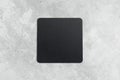 Square coaster on concrete background Royalty Free Stock Photo