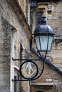 Square and Compass metal sign of The Masons and lantern attached at Wallington Hall in Bradford on Avon, Wiltshire, UK