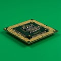 Square computer processor chip with a green circuit board, surrounded by a dense Royalty Free Stock Photo