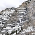 Square crop Bridal Veil Falls in Provo Canyon with water on steep slopes frozen in winter