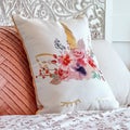 Square crop Fluffy pillows against decorative headboard of single bed against panelled wall