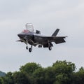 Square crop of the Lightning II landing vertically