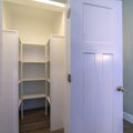 Square crop Looking into empty interior of a walk-in closet Royalty Free Stock Photo