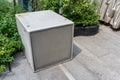 Square cube speaker for outdoor music. Monitor speaker in garden