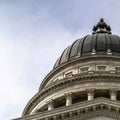 Square Dome and pediment of Utah State Capital building in Salt Lake City against sky