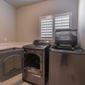 Square Electrical appliances in a laundry room interior