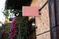 Square empty signboard on a building with classical architecture Royalty Free Stock Photo