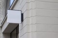 Square empty signboard on a building with classical architecture Royalty Free Stock Photo