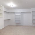 Square Empty white shelves in a fitted walk-in wardrobe Royalty Free Stock Photo