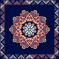 Square ethnic rug with flower mandala with purple petals and decorative frame.