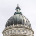 Square Famous dome of Utah State Capitol Building against cloudy sky in Salt Lake City Royalty Free Stock Photo