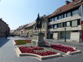 Square in flower with a statue of the district Buda of Budapest in Hungary.