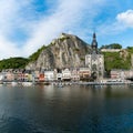 Square format view of the small town of Dinant on the Maas river with the historic citadel and cathedral on the river front Royalty Free Stock Photo