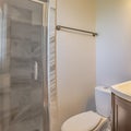 Square frame Bathroom interior of a home with toilet sink and cabinet against the white wall Royalty Free Stock Photo