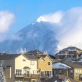 Square frame Beautiful houses on a snowy mountainside residential community in winter Royalty Free Stock Photo