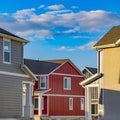 Square frame Dry cracked ground between houses lit by sunlight on a sunny day Royalty Free Stock Photo