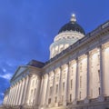 Square frame Facade of famous Utah State Capital Building glowing against vivid blue sky Royalty Free Stock Photo