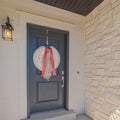 Square frame Front door of suburban home with welcome mat Royalty Free Stock Photo