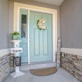 Square frame Green painted front door to a suburban house Royalty Free Stock Photo