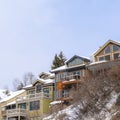 Square frame Homes with snowy roofs and balconies in scenic Park City Utah neighborhood Royalty Free Stock Photo