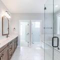 Square frame Interior of large bathroom with cohesive design and marble floor Royalty Free Stock Photo