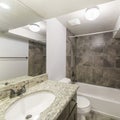 Square frame Interior of a small bathroom with white walls and tiles Royalty Free Stock Photo