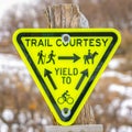 Square frame Inverted triangle Trail Courtesy Yield To sign with graphics and arrows