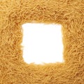 Square frame made of dry noodles pasta over isolated white background Royalty Free Stock Photo