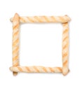 Square frame made of four loafs of french bread on white background