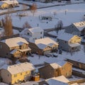 Square frame Residential neighborhood in Utah Valley on a scenic snowy aerial view in winter Royalty Free Stock Photo