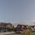 Square frame Three homes on a modern housing estate Royalty Free Stock Photo