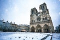 Square in front of Notre Dame de Paris under snow Royalty Free Stock Photo