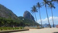 SQUARE IN FRONT OF THE RED BEACH WITH THE MORRO DO PAO DE AÃâ¡UCAR IN THE BACKGROUND Royalty Free Stock Photo