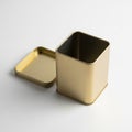 Open Square Gold Metal Tin Container with Lid on White Surface image photo Royalty Free Stock Photo