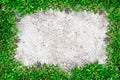 Square grass frame with copy-space on sand background Royalty Free Stock Photo