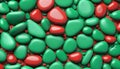 Combining green and red 3D stones to create a multicolored abstract background 3D render