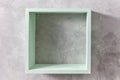 Box shelf isolated on stone gray background.