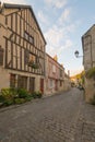 Square with half-timbered houses, in the medieval village Noyers-sur-Serein Royalty Free Stock Photo