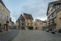 Square with half-timbered houses, in the medieval village Noyers-sur-Serein Royalty Free Stock Photo