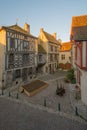 Square with half-timbered houses, in the medieval village Noyers-sur-Serein Royalty Free Stock Photo