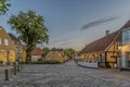 The square in the idyllic town Mariager in the dusk twilight hour